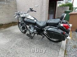 Motorcycle 125cc. Black. Great looking bike needs tlc stored for the last year